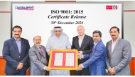 Vice Chairman and Managing Director of Jumbo Electronics, Sajed Jassim Mohammed Sulaiman; and the Director & CEO of Jumbo Electronics, C V Rappai, along with other officials receiving the ISO re-certification.