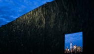 One World Trade Center (C), also known as the Freedom Tower, stands out on the Manhattan skyline on December 31, 2024 in New York. (Photo by CHARLY TRIBALLEAU / AFP)
