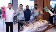 A bluefin tuna from Oma, Aomori Prefecture, which was purchased earlier in the day for 1.3 million USD, is presented to the media following the first tuna auction of the New Year at Tokyo's Toyosu Market on January 5, 2025. (Photo by JIJI PRESS / AFP)