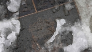 A photograph taken on January 5, 2025, shows Snows of pavement outside Anfield in Liverpool, north west England on January 5, 2025. (Photo by Darren Staples / AFP) 