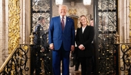 This handout picture released by the Palazzo Chigi press office on January 5, 2025 shows Italy's Prime Minister Giorgia Meloni posing with US President-elect Donald Trump at his Mar-A-Lago Club on January 4, 2025 in Palm Beach, Florida. (Photo by Filippo ATTILI / Palazzo Chigi press office / AFP)