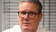 Britain's Prime Minister Keir Starmer talks with nurses and staff during a visits to a healthcare provider in Surrey, south-west of London on January 6, 2025. Photo by Leon Neal / POOL / AFP