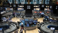 A file photo of the traders working on the floor of the New York Stock Exchange in New York, US. (AFP)