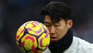 Tottenham Hotspur's South Korean striker #07 Son Heung-Min warms up ahead of the English Premier League football match between Tottenham Hotspur and Newcastle United at the Tottenham Hotspur Stadium in London, on January 4, 2025. (Photo by Adrian Dennis / AFP)