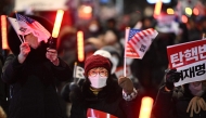 Supporters of impeached South Korea president Yoon Suk Yeol take part in a rally near his residence in Seoul on January 7, 2025. Photo by Philip FONG / AFP