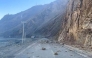 This frame grab from a user-generated content (UGC) video on January 7, 2025 shows rocks on a road near the Shigatse national highway in China's Tibet after an earthquake struck the area. (Photo by UGC / AFP) 