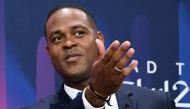 (FILES) UEFA Champions League final ambassador and former Dutch footballer Patrick Kluivert attends a ceremony of the draw for the quarter-final, semi-final and final of the 2022-2023 UEFA Champions League football tournament, in Nyon, on March 17, 2023. (Photo by Fabrice COFFRINI / AFP)
