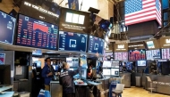 A file photo of traders working at the New York Stock Exchange in New York, US.