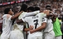 Real Madrid's players celebrate their first goal during the Spanish Super Cup semi-final football match between Real Madrid and Mallorca at the King Abdullah Sport City in Jeddah on January 9, 2025. (Photo by Fadel Senna / AFP)