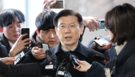 Head of the Presidential Security Service (PSS) Park Chong-jun (C) arrives outside the National Office of Investigation in Seoul on January 10, 2025. Photo by YONHAP / AFP