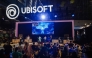 Visitors dance at the Ubisoft stand during the Paris Games Week fair in Paris, on October 23, 2024. Photo by Dimitar DILKOFF / AFP