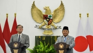 Indonesia's President Prabowo Subianto (R) and Japan's Prime Minister Shigeru Ishiba give a press statement following their meeting at the presidential palace in Bogor, West Java, on January 11, 2025. (Photo by Bay Ismoyo / AFP)