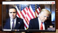 Todd Blanche, attorney for former US President Donald Trump, and US President-elect Donald Trump are seen on the screen at Manhattan criminal court in New York, on January 10, 2025. (Photo by Brendan McDermid / POOL / AFP)