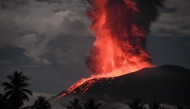 This handout picture taken and released on January 11, 2025 by Indonesian Geological Agency shows Mount Ibu spewing volcanic material approximately 4,000 meters high during an eruption as observed from the Mount Ibu Volcano Observation Post in West Halmahera, North Maluku on January 11, 2025. Photo by Handout / Indonesian Geological Agency / AFP