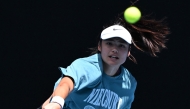 Britain's Emma Raducanu serves during a practice session ahead of the Australian Open tennis tournament in Melbourne on January 10, 2025. (Photo by WILLIAM WEST / AFP)