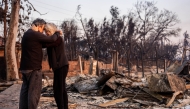 Actress Gail Matthius Wirth and writer John Wirth, showrunner and executive producer for 'Dark Winds', see their burnt home for the first time, in Pacific Palisades, California, on Thursday. (Photo by Melina Mara/The Washington Post)