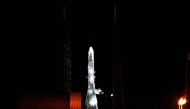 Blue Origin New Glenn rocket sits at Launch Complex 36 after its scheduled early morning launch was cancelled at Cape Canaveral Space Force Station on January 13 in Cape Canaveral, Florida. Photo by Miguel J. Rodriguez Carrillo / GETTY IMAGES NORTH AMERICA / Getty Images via AFP