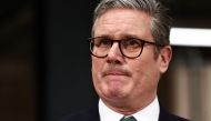 Britain's Prime Minister Keir Starmer reacts while delivering a speech during a visit of the Manufacturing Futures Lab at UCL (Unnivesrity College London), in London, on January 13, 2025. (Photo by HENRY NICHOLLS / POOL / AFP)
