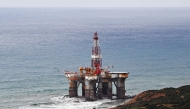 A general view of an oil platform that skidded is pictured on the beach of Hwaichat in Bizerte region, on January 13, 2025, after the traction cables connecting the platform to the ship that was pulling it broke, local media reported. (Photo by Fethi Belaid / AFP)