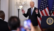 US President Joe Biden reacts to a standing ovation as he arrived to deliver a speech about his foreign policy achievements in the Ben Franklin Room at the State Department's Harry S Truman headquarters building in Washington, DC, on January 13, 2025.(Photo by Chip Somodevilla/Getty Images/AFP)