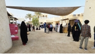 People visit an activation at Ras Abrouq.