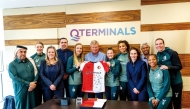 QTerminals officials with Feyenoord women’s team.