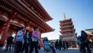 Tourists visit Sensoji Temple in Asakusa, Tokyo on January 14, 2025. Photo by Kazuhiro NOGI / AFP