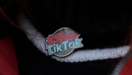 A detail view of the pin worn by TikTok educational influencer, Tiffany Cianci as she livestreams outside the U.S. Supreme Court Building while the court hears oral arguments on whether to overturn or delay a law that could lead to a ban of TikTok in the U.S., on January 10, 2025 in Washington, DC. Photo by Kayla Bartkowski / GETTY IMAGES NORTH AMERICA / Getty Images via AFP.