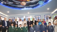 Ambassador of India to Qatar H E Vipul with officials, guests and students during the inauguration of Space and Robotics Lab. 