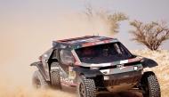 Qatari driver Nasser Al Attiyah and French co-driver Edouard Boulanger compete in the ninth stage of the Dakar Rally 2025.