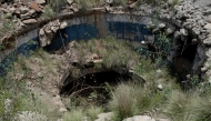 The entrance shaft of an abandoned mine is seen in Stilfontein on January 14, 2025. Photo by Christian Velcich / AFP