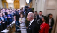 US President Joe Biden walks into the East Room of the White House to applause before signing proclamations to establish the Chuckwalla National Monument and the Sattitla Highlands National Monument in California, in Washington, DC, on January 14, 2025. (Photo by Roberto Schmidt / AFP)
 