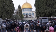 Approximately 60,000 worshippers attended the Friday prayer in Al-Aqsa Mosque. (Photo by Hazem Bader / AFP)