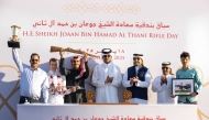 H E Sheikh Hamad bin Joaan Al Thani presented the H E Sheikh Joaan Bin Hamad Al Thani Rifle to Al Jeryan Stud’s representatives after Aafoor's victory at Al Rayyan Racecourse yesterday.   