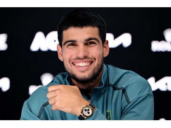 This handout picture released by the Tennis Australia on January 19, 2025 shows Spain's Carlos Alcaraz speaks at a press conference in Melbourne. (Photo by Vince Caligiuri / Tennis Australia / AFP) 