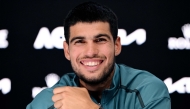 This handout picture released by the Tennis Australia on January 19, 2025 shows Spain's Carlos Alcaraz speaks at a press conference in Melbourne. (Photo by Vince Caligiuri / Tennis Australia / AFP) 