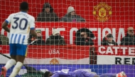 Manchester United's Cameroonian goalkeeper #24 Andre Onana reacts after failing to stop Brighton's third goal scored by Brighton's French midfielder #14 Georginio Rutter during the English Premier League football match between Manchester United and Brighton and Hove Albion at Old Trafford in Manchester, north west England, on January 19, 2025. (Photo by Ian HODGSON / AFP)