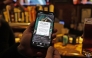 A TikTok user holds a phone showing the screen of the social media app on January 18, 2025 in Washington, DC. (Photo by Justin Sullivan/Getty Images/AFP)