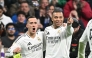 Real Madrid's French forward #09 Kylian Mbappe celebrates scoring his team's third goal with Real Madrid's Spanish defender #17 Lucas Vazquez during Spanish league football match between Real Madrid CF and UD Las Palmas at the Santiago Bernabeu stadium in Madrid on January 19, 2025. (Photo by JAVIER SORIANO / AFP)
