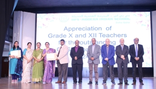 DPS Modern Indian School officials among others while receiving the certification.