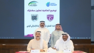 The officials of Qatar Rugby and Hockey Committee and UAE Rugby Federation during the cooperation agreement signing ceremony.