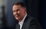 Australian TV sports presenter and journalist Tony Jones is seen on day nine of the Australian Open tennis tournament in Melbourne on January 20, 2025. (Photo by Martin Keep / AFP)