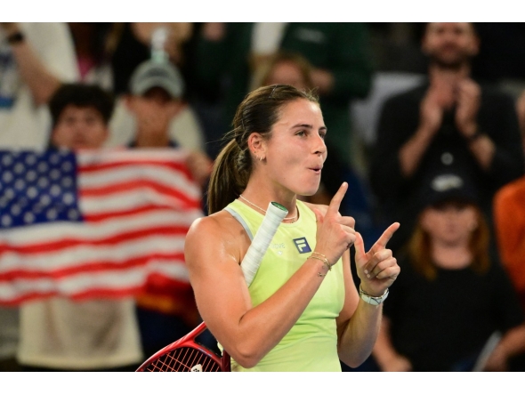 USA's Emma Navarro celebrates after her victory against Russia's Daria Kasatkina during their women's singles match on day nine of the Australian Open tennis tournament in Melbourne on January 20, 2025. (Photo by Yuichi YAMAZAKI / AFP)