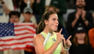 USA's Emma Navarro celebrates after her victory against Russia's Daria Kasatkina during their women's singles match on day nine of the Australian Open tennis tournament in Melbourne on January 20, 2025. (Photo by Yuichi YAMAZAKI / AFP)