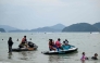 Visitors rent jet skis at Pantai Cenang in Malaysia's Langkawi Island on January 19, 2025. (Photo by Mohd Rasfan / AFP)