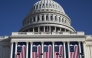 The Capitol is adorned with flags ahead of President-elect Donald Trump's second inauguration. (Photo by Marvin Joseph/The Washington Post)
