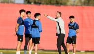 Al Rayyan coach Artur Jorge gives instructions to players during a training session as his team prepares for their upcoming clash against Al Duhail.