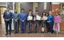 Principal, other officials and Birla Public School students with medals and certificates they received in the competition.