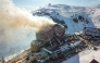 This handout photograph released by the Demiroren News Agency (DHA) on January 21, 2025, shows an aerial picture of a fire on the fourth floor of the 11-storey hotel in Bolu's Kartalkaya ski resort. (Photo by DHA (Demiroren News Agency) / AFP) 