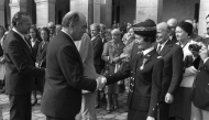 (FILES) This photograph taken in Paris on September 17, 1981 shows French President Francois Mitterrand (L) shaking hands with Valerie Andre, French Inspector General of the Army Medical Corps, during a ceremony where she received the rank of Grand Officer of the Legion of Honour. (Photo by MICHEL CLEMENT / AFP)
